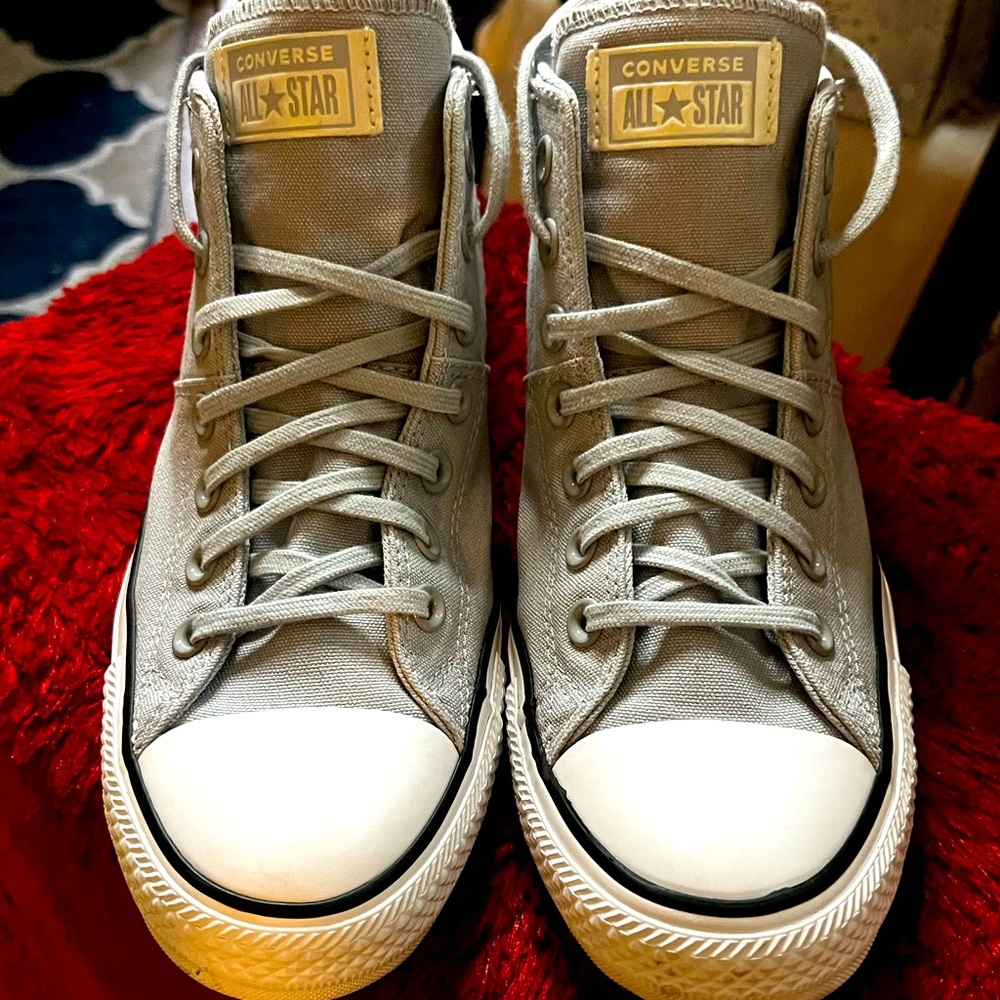 Grey mid top Chuck Taylor with iridescent emblem